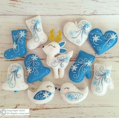 some blue and white decorations on a wooden table