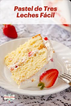 a piece of cake on a plate with strawberries