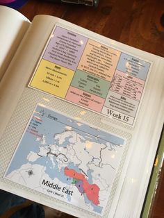 an open book with several different maps on it