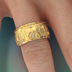 Embrace the timeless elegance of history with our Ancient Roman Style Gold Ring, a beautifully crafted piece that echoes the grandeur of the Roman Empire. This stunning ring features a classic design, highlighted by a sparkling diamond band, making it a perfect blend of ancient artistry and modern sophistication Band measurements: approx. 10mm wide , approx 2 mm thickMaterial: 18 solid gold, 14k solid goldColor: white gold, yellow gold and rose goldStone Type: 100% Natural DiamondsShape: 13 Roun Elegant Gold Engraved Ring With Diamond Accents, Elegant Yellow Gold Engraved Ring With Diamond Accents, Elegant Engraved Yellow Gold Ring With Diamond Accents, Timeless Gold Engraved Ring With Diamond Accents, Gold Engraved Ring With Diamond Accents, Yellow Gold Engraved Diamond Ring With Accents, Elegant Engraved Diamond Ring In Yellow Gold, Luxury Engraved Diamond Ring With Round Band, Elegant Engraved Yellow Gold Diamond Ring