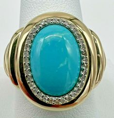 14K YELLOW GOLD RING, WITH AN OVAL NATURAL TURQUOISE GEMSTONE ENCIRLED WITH DIAMONDS. THE RING IS MARKED: 14K FP. SIZE 10. WEIGHT 7.4 GRAMS. IN GOOD CONDITION WITH SOME LIGHT WEAR. Diamond Halo Ring, Ring Pictures, Halo Diamond Ring, Yellow Gold Ring, Halo Ring, Halo Rings, Diamond Halo, Natural Turquoise, Turquoise Gemstone