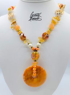 This is a classy necklace that will compliment your fall outfit. It was made using natural citrine beads and Jesse James beads glass beads. It is 22 inches long and the pendant adds approximately 3 inches in length. The metal components are lead, nickel and cadmium free. Ships 2-3 business days. Luxury Handmade Orange Necklaces, Summer Necklace Beach, Classy Necklace, Citrine Beads, Jesse James, Spring Jewelry, Summer Necklace, Natural Citrine, Beach Jewelry