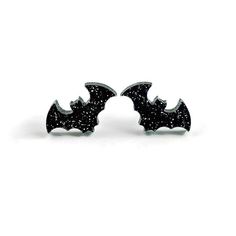 Fun and spooky these black bat earrings are the perfect accessory for Halloween. Made of laser cut black acrylic with silver sparkles, these earrings are lightweight and comfortable. - 20 x 13 mm (.79 x .5 in) bat - Nickel free stainless steel posts - Lightweight acrylic ★ ★ ★ Become a VIP and get 20% off your first purchase plus access to exclusive sales, sneak peeks and monthly giveaways. Copy and paste this link into your browser to sign up: bit.ly/levantervip Goth Rockabilly, Rose Gold Statement Earrings, Vintage Inspired Earrings, Bat Earrings, Cute Goth, Cute Bat, Glitter Acrylic, Black Bat, Glitter Acrylics