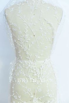 Glittery Leaf Motif Bridal Lace Fabric for Designer Dresses Sheer Lace Embroidered Fabric For Wedding, Wedding Lace Tulle Fabric With Floral Applique, Floral Embroidery Net Dress For Wedding, Net Dress With Floral Embroidery For Wedding, Fitted Lace Tulle Fabric With Floral Applique, White Floral Tulle Fabric, Sheer Lace Tulle Fabric For Wedding, Fitted White Tulle Fabric With Floral Applique, Fabric Board