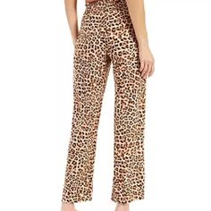 Pull-On Style Cheetah Print; Tie-Front Belt; Elasticized Waist Polyester/Spandex Machine Washable Waist Approx 34.5” Inseam 31” Fitted Leopard Print Pants For Summer, Leopard Print Bottoms For Summer Loungewear, Summer Loungewear Bottoms In Leopard Print, Leopard Print Pants For Summer Loungewear, Leopard Print Loungewear Bottoms For Summer, Chic Leopard Print Vacation Bottoms, Leopard Print Loungewear Pants For Summer, Fitted Tiger Print Bottoms For Summer, Fitted Leopard Print Pants For Loungewear