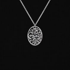 "Title: Travel dua safar for car necklace Muslim dua charm Dua pendant Islamic dua necklace Quran necklace Quran pendant Quran jewelry Bereket dua Dimensions: As in the picture - This is a travel dua necklace for muslims. The following is written on the necklace: \"سبحان الذي سخر لنا هذا وما كنا له مقرنين وإنا إلى ربنا لمنقلبون\" which means in English: Glory is to Him Who has provided this for us though we could never have had it by our efforts. Surely, unto our Lord we are returning. - Made fr Amulet Style Pendant Necklace With Charms, Silver Chain Necklace With Detachable Pendant As Gift, Silver Charm Necklace With Detachable Pendant As Gift, Spiritual Silver Oval Pendant Necklaces, Traditional Oval Necklace As Gift, Silver Charm Necklace With Detachable Pendant, Silver Oval Necklaces With Charms, Traditional Silver Necklace For Eid, Silver Amulet Chain Necklace As Gift