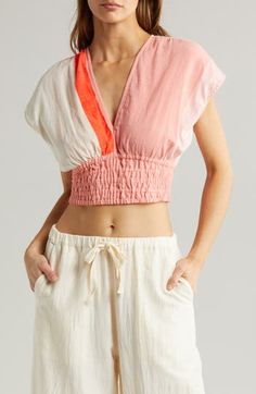 This hand-spun cotton-blend top woven by artisans makes a perfect poolside cover-up with a wide smocked hem and a perfectly cropped length. 17" length (size Medium) Deep V-neck Short sleeves Smocked waist 95% cotton, 5% acrylic Dry clean Imported Black Owned/Founded Hand Spinning, Deep V Neck, Smocking, Spun Cotton, Top Shirt, Top Brands, Cover Up, Crop Top, Blush