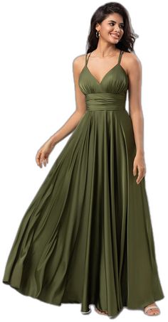 a woman in a green dress is smiling