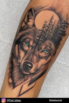 a wolf with blue eyes and trees on his arm