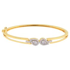 The warm glow of the yellow gold provides the perfect backdrop for the shimmering diamonds, enhancing their natural beauty and adding a touch of timeless elegance to the design. The smooth and polished surface of the bangle ensures a comfortable fit, while the secure clasp closure ensures that the bracelet stays securely in place throughout the day. Item Code :- SEB-6088 Gross Wt. :- 10.25 gm 18k Yellow Gold Wt. :- 10.17 gm Natural Diamond Wt. :- 0.40 Ct. ( AVERAGE DIAMOND CLARITY SI1-SI2 & COLO Modern Bangle, Diamond Bangle Bracelet, Modern Bracelets, Yellow Gold Bangle, Diamond Bangles Bracelet, Bracelets Gold Diamond, Yellow Gold Jewelry, Gold Bangle Bracelet, Diamond Bangle