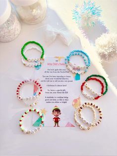 ♡ Christmas/Holiday Bracelet ♡ ━━ ♥︎ ━━ These bracelets are crafted with love to make Christmas even more special for your little ones. These bracelets are a festive addition to their holiday attire, adding a touch of charm and excitement to the season. And the included elf note? It's a little extra sprinkle of magic to enhance their Christmas experience, sparking smiles and creating treasured memories that will last a lifetime. ━━ ♥︎ ━━ Materials: 14K Gold Filled Beads  White/Gold Acrylic Lette Elf On The Shelf Bracelets, Elf Bracelet, Xmas Bracelets, Christmas Beaded Bracelets, Holiday Bracelet, Bracelet Word, Elf Letter, Elf Notes, Xmas Jewelry