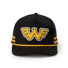 The classic Waylon 'Flying W' chenille patch front and center. The Flying W is a high profile snapback and features a foam front with a mesh backing for breathability.Details: Chenille 'Flying W' logo patch High profile snapback "Hey Good Lookin" tag on inside of hat One size fits most Adjustable snapback closure 65% Cotton, 35% Nylon Waylon Jennings, Black Trucker Hat, Chenille Patch, Hey Good Lookin, Music For Kids, Snapback Hat, Snapback Hats, Patch Logo, Hats For Men