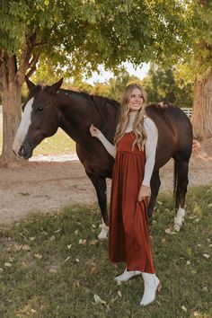 Get ready to turn heads in THE ADA SATIN MIDI DRESS! In a captivating amber color, this pretty dress is perfect for any occasion. With a midi length and skinny straps, it's both elegant and flirty. Plus, the tie back adds a touch of uniqueness to your outfit. A must-have for your wardrobe! Paired with THE CONNER RIBBED TURTLE NECK IN TAUPE & THE MIMI COWGIRL BOOTS IN WHITE Scoop neck Spaghetti strap Tie back Midi length 97% polyester, 3% spandex Dress runs true to size. Small (2-4), Medium (6-8) Fitted Bohemian Prairie Dress, Midi Length, Happy Threads, Summer Goddess, Pink Desert, Spandex Dress, Exclusive Clothing, Nursing Friendly, Ribbed Turtleneck, Pretty Dress