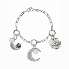 Wear divine lunar energy at all times with this undeniably cute charm bracelet. This perfect set of three celebrates all the mystery and beauty of protective, feminine moon energy, and includes our Charm Collector Bracelet with the white topaz Watchful Moon Eye, mother of pearl Man in the Moon, and the pavé white topaz Twisted Moon Amulet, each accented with a fiery Opal Amulet. Sterling Silver Bracelet With Moon Charm, Sterling Silver Bracelets With Moon Charm, Elegant Sterling Silver Bracelets With Moon Charm, Celestial Sterling Silver Bracelets, Sterling Silver Celestial Bracelet With Moon Charm, Sterling Silver Moon Charm Bracelet, Sterling Silver Moon Phase Bracelet As Gift, Sterling Silver Moon Phase Bracelet For Gift, Luxury Silver Jewelry With Moon Charm