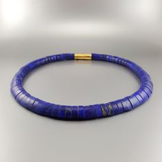 Statement necklace collier matte Lapis Lazuli with gold plated clasp. Unique gift for her, wife, girlfriend, September and December birthstone, 9 year anniversary. The stunning deep blue color brings happiness and is filled with elegance and grace. The matte Lapis with its special cut, combine wonderful to a warm and gracious collier. A special designed clasp finishes the necklace in a matching shape. This collier is double strung on very strong stainless steel, for perfect fit. All our stones a Mineral Necklace, 9 Year Anniversary, Beaded Chocker, Buddhist Necklace, Ivory Necklace, Czech Glass Necklace, Blue Statement Necklace, Chunky Bead Necklaces, Lapis Lazuli Jewelry