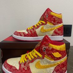 Custom Red, Yellow Iced Out Blingged Nike Air Sneakers With Yellow Strings, Measures 26cm Long, Size Euro 41, Usa Men's 8 No Box. (Shoes Will Not Be Shipped With Shoe Box) I Will Put In A Packing/Shipping Box And Properly Secure And Wrap Them Up For Protection.) If Shipped In Shoe Box All Labels Will Be Removed, Due To Customizations. Note: Shoes May Have Small Imperfections That's Beyond My Control. Sneakers Are Fully Blinged With Different Clear/Transparent, Yellow And Red Stones, With Hand Pa Luxury Custom Orange Sneakers With Red Sole, Luxury Red Custom Sneakers With Nonskid, Orange Custom Sneakers With Red Sole, Luxury Orange Custom Sneakers For Streetwear, Yellow High-top Custom Sneakers With Perforated Toe Box, Nike Air Sneakers, Air Sneakers, Tie Dye Shoes, Black Basketball Shoes