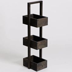 a wooden shelf with four compartments on each side