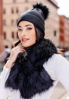 Crazy-cute and wearable, the Metallic Pom Hat is so cool, you'll wear it before the leaves fall. Why not -- in Metallic Black knit, it's stretchy and comfy. Better still, this substantial knit has recovery as well. Easy to pull on, the cap, when cuffed, measures 8" from the fur pom to the cuff fold. Ahhh, but the pièce de résistance is the oversize Black Fox pom. The magic of mixing Metallic knit with fur bestows a broad license to wear the Metallic Pom Hat with anything, everywhere. With denim, a fur jacket, or a cashmere overcoat, the Metallic Pom Hat is all in. Going to work, walking the dog, and for errands, the Metallic Pom Hat is perfect. When life happens, refresh our favorite hat with machine wash/cold/dry flat care. Warm Bonnet For Fall, Winter Cold Weather Bonnet, One Size, Winter Knit Bonnet, One Size Fits Most, Warm Bonnet For Fall, One Size Fits Most, Knitted Bonnet For Fall, One Size, Knitted Bonnet For Fall, One Size Fits Most, Knitted Fall Bonnet One Size, Soft Knit One Size Bonnet For Fall, Fall Soft Knit One-size Bonnet