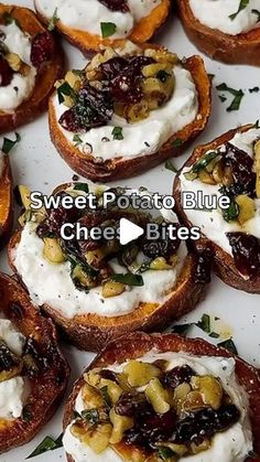 sweet potato blue cheese bites with cranberry sauce and walnuts on white plate