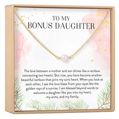 a box with a necklace in it that says, to my son's daughter