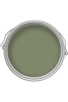 a green paint with white trim on the bottom, and an empty tin in the middle