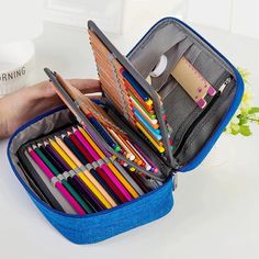 1PCS Multi-function Pencil Bag 72 Slot Large Capacity Painting Pen Holder Storage Box Zipper Bag Gadget Stationery Supplies NEW SPECIFICATIONS Novelty: No Category: Pencil Bag Use: Schools & Offices Type: pencil case Features: Exquisite workmanship and sturdy zippers enhance style, elegance and durability. Compact pen case for maximum storage space. The handle can carry colored pencils anytime, anywhere. The internal zip pocket is wide and suitable for sharpeners, erasers, cables and other gadgets. This pen holder has three layers, two of which are detachable and equipped with a powerful Velcro for organizing colored pencils. The 72 stretchable rings are the best solution for organizing all colored pencils, pens and painting materials. Size: 9.3" x 6.5" x 2.8 Material: Oxford (23.5 cm x 16 Multifunctional Portable Pencil Case For Students, Multifunctional Portable Pencil Case For School, Multifunctional Portable Pencil Case, Multifunctional Portable Rectangular Pencil Case, Back To School Pencil Shaped Pencil Case, School Pencil Case With Zipper Closure, Back To School Pencil-shaped Organizer With Zipper, Portable Pencil Case For Daily Use, Portable Pencil Case For Back To School