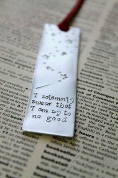 a bookmark that reads, i solemnly swear it but i am not to god