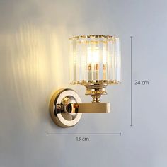 an image of a wall light that is on the side of a wall with measurements