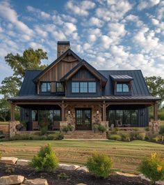 a large house with lots of windows and stone steps