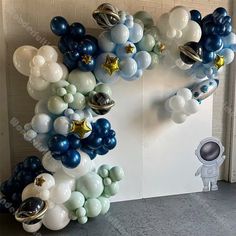 an arch made out of balloons and stars