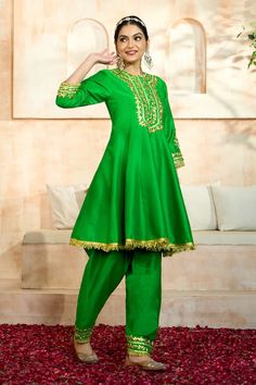 Green short anarkali with floral pattern gota embroidery. Comes with matching salwar and dupatta. - Aza Fashions Navratri Dabka Kurta In Chinon, Festive Dola Silk Sets With Dabka, Raw Silk Salwar Kameez With Mirror Work For Eid, Bollywood Cotton Silk Sets With Resham Embroidery, Navratri Chinon Kurta With Dabka Work, Navratri Dabka Work Kurta In Chinon, Bollywood Style Dola Silk Sets For Eid, Bollywood Style Resham Embroidery Cotton Silk Set, Festive Mulmul Sharara With Dabka Detailing