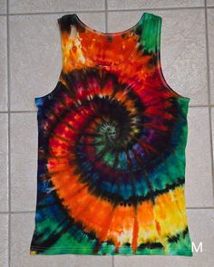 Unisex size tank tops Heavy cotton 5.3 oz These are ready to ships and receive thr exact item in listing photo. These ship the next day unless purchased with a made to order then it will ship when those are finished. Cotton Festival Tank Top, Hand Dyed Tie Dye Sleeveless Tank Top, Hand Dyed Cotton Tank Top, Tie Dye Cotton Sleeveless Tank Top, Festival Acid Wash Cotton Tank Top, Acid Wash Cotton Tank Top For Festivals, Cotton Tie Dye Tank Top For Festivals, Cotton Tie-dye Tank Top For Festival, Acid Wash Cotton Tank Top