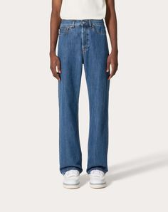 Valentino denim trousers - Baggy fit - Five pockets - Composition:100% Cotton - Length: 108.5 cm / 42.7 in. in an Italian size 30 - Leg opening: 23.8 cm / 9.4 in. in an Italian size 30 - The model is 187 cm / 6'1" tall and wears an Italian size 30 - Made in Italy The look of the model is completed by Valentino Garavani Valentino Garavani Runboot Shoes. Denim Blue Wide Leg Jeans With Welt Pockets, Wide Leg Denim Blue Jeans With Welt Pockets, Wide Leg Jeans With Welt Pockets In Denim Blue, Modern Jeans With Welt Pockets, Modern Denim Jeans With Welt Pockets, Wide Leg Rigid Denim Jeans With Welt Pockets, Wide Leg Denim Jeans With Welt Pockets, Medium Wash Straight Leg Jeans With Welt Pockets, Straight Leg Jeans With Welt Pockets In Medium Wash