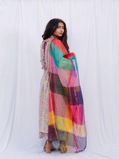 Welcome this season with round neck kurti with an intricate colorful heavy print and a pintuck detailing on the yoke. Paired with this ghera kurta is a similar print palazzo and a pure chanderi printed duppata. Features: 100% Premium Cotton Printed Suit Set Chanderi Dupatta Comfort fit Model height is 5.5 feet and is wearing size M Wash Care Instructions: Dry Clean Only Note: The product will be delivered within 15-20 days of the order placed. The product can be made on order, in which case the Bohemian Chanderi Palazzo Set With Long Sleeves, Bohemian Long Sleeve Chanderi Palazzo Set, Silk Kurta With Digital Print For Diwali, Bollywood Style Multicolor Printed Anarkali Set, Festivals Cotton Silk Kurta With Sheer Dupatta, Traditional Palazzo Set With Digital Print, Semi-stitched Bohemian Kurta With Sheer Dupatta, Multicolor Anarkali Kurta With Sheer Dupatta, Multicolor Anarkali Set With Printed Motifs For Navratri