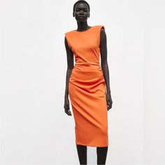 Padded Shoulders, Ruching On The Sides, V Back. Elegant Stretch Orange Dress, Elegant Orange Stretch Dress, Elegant Orange Stretch Midi Dress, Orange Midi Dress For Summer Workwear, Elegant Sleeveless Orange Midi Dress, Summer Orange Midi Dress For Workwear, Elegant Orange Sleeveless Midi Dress, Summer Workwear Orange Midi Dress, Elegant Orange Ruched Midi Dress