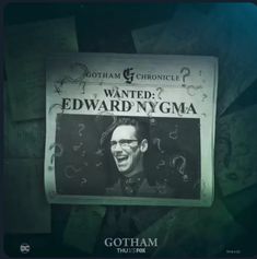 the poster for edward nygma's upcoming show is displayed in front of many papers