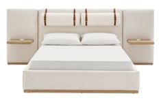 a bed with white linens and wooden headboard, made up to look like it is