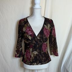 Item: Brown Rose Lace Blouse Condition: Nwot Details: This Is A Brown Lace Blouse With Roses On It, Comes Down Into A Vneck, With A Stretchy Lightweight Material. Size: Medium Brand: Biyaycda Career Fitted Party Tops With Rose Print, Deep V Neck Tops, Butterfly Print Dress, Floral Shirts, Rose Lace, Lace Blouse, Boho Tops, Butterfly Print, Floral Shirt