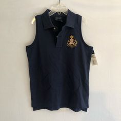 Dark Blue Sleeveless Collared Shirt With Large Polo Logo, Kids Large 12-14 Navy Ralph Lauren Cotton Tops, Casual Blue Sleeveless Vest, Navy Sleeveless Cotton Vest, Navy Casual Cotton Tank Top, Casual Navy Cotton Tank Top, Blue Cotton Sleeveless Tank Top, Blue Cotton Sleeveless Top, Navy Sleeveless Cotton Tops, Blue Sleeveless Vest Top