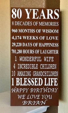 a wooden sign that says 80 years and reads,'decades of memorys '