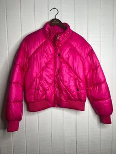 Stay chic and cozy in this Rue Woven Padded Jacket in Pink! This fashionable fuchsia-colored piece is sure to keep you warm and stylish. Keep the chill away and make a fashion statement in this comfy-cute vest. Perfect for every outdoor adventure! Pink Nylon Puffer Jacket For Spring, Pink Nylon Puffer Outerwear, Casual Pink Nylon Puffer Jacket, Pink Nylon Puffer Jacket For Fall, Pink Quilted Nylon Puffer Jacket, Pink Nylon Outerwear For Fall, Pink Winter Puffer Jacket With Pockets, Pink Puffer Winter Outerwear, Pink Puffer Jacket With Pockets For Winter