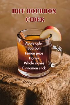 an apple cider with cinnamon sticks in it and the words hot bourbon cider