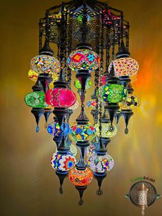 a multi colored chandelier hanging from the ceiling