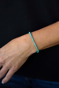 Add a touch of elegance to any outfit with the Shine Turquoise Silver Bracelet. This stretchy bracelet features solid natural stones that are meant to be layered and stacked for a chic look. Whether it's a casual day out or a special occasion, this bracelet is the perfect accessory. Everyday Turquoise Stackable Stretch Bracelet, Turquoise Hand-strung Stretch Bracelet, Everyday Turquoise Hand-strung Stretch Bracelet, Everyday Hand-strung Turquoise Stretch Bracelet, Turquoise Beaded Bracelets For Everyday Wear, Everyday Turquoise Beaded Bracelets, Everyday Hand-strung Turquoise Bracelet, Everyday Turquoise Beaded Bracelet, Moonstone Necklace Silver