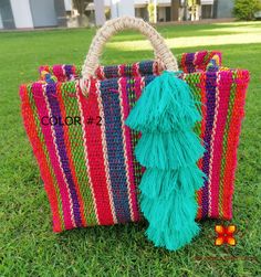 Fashionable tote, beautiful and durable bag, very practical and spacious, the strap is soft and comfortable. This Traditional Mexican Backpack is perfect to style with any outfit. Crossbody bag crochet embroidered by Mexican hands. Each piece is unique and handmade with dedication and taking care of every detail achieving the best quality in our products. MEASUREMENTS 10-11 inches wide 13-14 inches height *In the unlikely event that your item is faulty in any way, a full refund Will be given inc Jute Tote Bag For Market, Multicolor Jute Crochet Bag For Everyday Use, Multicolor Jute Beach Bag For Everyday Use, Multicolor Jute Crochet Bag For Daily Use, Handmade Canvas Tote Bag For Vacation, Handmade Natural Canvas Tote Bag, Large Handmade Bag, Double Handle Jute Bag For Market, Handmade Multicolor Straw Bag With Double Handles