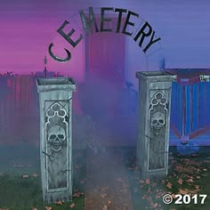 two gothic tombstones in front of a cemetery gate with the word cemetery on it