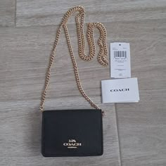 Brand New With Tag, Never Used. Coach Mini Wallet On Chain. Coated Canvas With Shiny Gold Tone Hardware. The Color Is Black. Button Snap Closure. Removable Chain Strap. A Couple Of Card Slots On The Inside. Wear As A Micro Bag Or Remove The Chain As Use As A Wallet/Card Holder. Perfect For Everyday Use. Durable, Practical And Versatile. Timeless And Classic. Adorable And So Fun To Wear. Coach Mini Wallet On A Chain, Coach Wallet On Chain, Wallet On Chain Outfit, Heel Outfits, Coach Mini Wallet, Dior Mini Bag, Coach Sling, Chain Outfit, Micro Bag