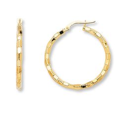 Slim and dramatic, these 14K yellow gold hoop earrings glisten with a Florentine block design. The earrings secure with hinged backs. Anniversary Yellow Gold Clip-on Hoop Earrings, Anniversary Yellow Gold Hinged Hoop Earrings, Modern Gold Diamond Cut Huggie Earrings, Modern Gold Huggie Earrings With Diamond Cut, Yellow Gold Clip-on Hoop Earrings, 14k Gold Clip-on Hoop Earrings, Gold Stock, Jewelry Education, Jewelry Advice