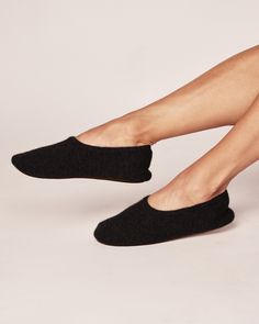 Step into a world of relaxation with our Cashmere Slippers. Made from Grade A 100% pure cashmere, these slippers cocoon your feet with unrivaled softness. Sink your toes into the plush texture and experience instant warmth and comfort. The meticulous craftsmanship ensures a snug and cozy fit making these slippers a delightful treat for your feet. Lining of insole is 100% cotton, comes with slipper bag. Comfortable Slip-on Slippers With Soft Texture, Comfy Soft Slippers For Relaxation, Comfortable Soft Slippers For Relaxation, Super Soft Comfortable Slippers For Relaxation, Cozy Slippers For Relaxation, Comfortable Super Soft Slippers For Relaxation, Comfortable Slippers For Relaxation, Soft Slip-on Slippers For Relaxation, Cozy Black Slippers For Indoor Use