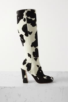 Amina Muaddi might be known for its statement pumps, but its collections also include styles like these 'Marine' knee boots. They're paneled from smooth cow-print pony hair with angled block heels and square toes. Amina Muaddi Shoes, Heel Knee High Boots, Cowboy Shoes, Black And White Heels, Boot Print, Amina Muaddi, Shoe Inspo, White Square, Pony Hair